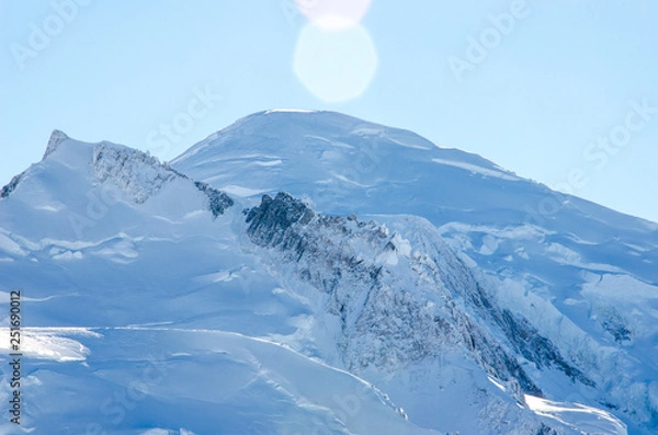 Fototapeta Touch the amazing Mont Blanc summit and the glaciers around with your fingers. The closest view of the highest european mountain in french region Chamonix-Mont-Blanc during winter time. 