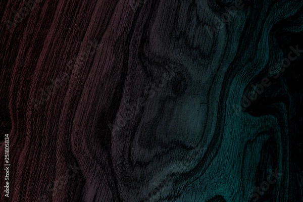 Fototapeta Abstract black wood panel with neon blue and pink texture background