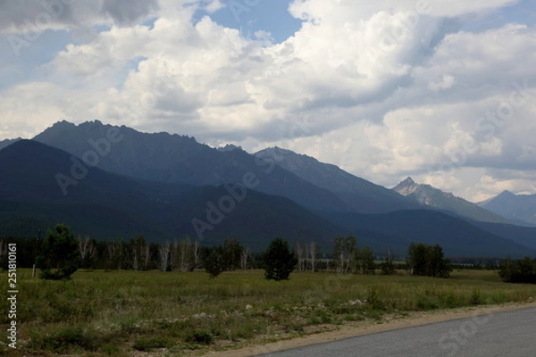 Obraz The mountains of the Barguzin mountains, this valley of the Barguzin river Steppe in the floodplain of the Barguzin river, then-birch forest belt, and behind it-the mountains of Barguzin ridge and the