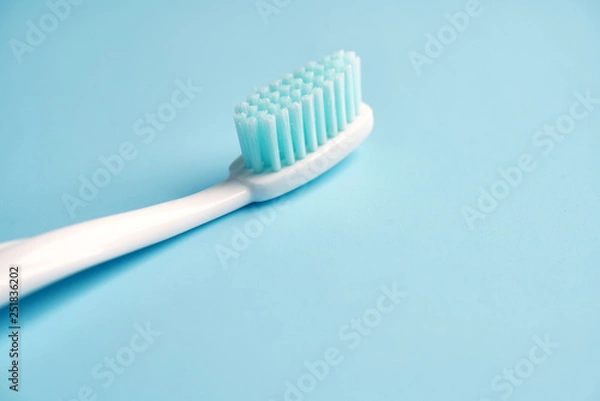 Fototapeta Toothbrushes on color table