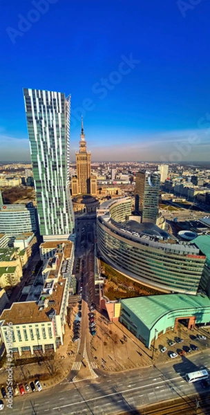 Obraz WARSAW, POLAND - FEBRUARY 23, 2019: Beautiful panoramic aerial drone view to the center of Warsaw City and "Zlota 44", residential skyscraper designed by American architect Daniel Libeskind