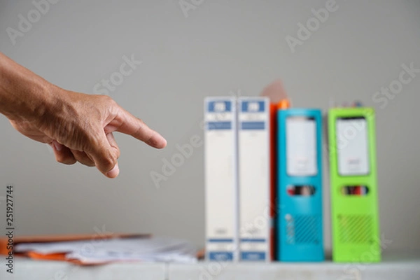 Obraz finger pointing the file 