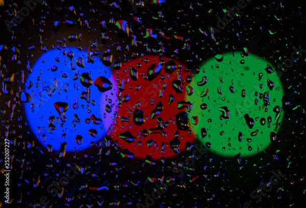 Obraz colourful bokeh background with raindrops