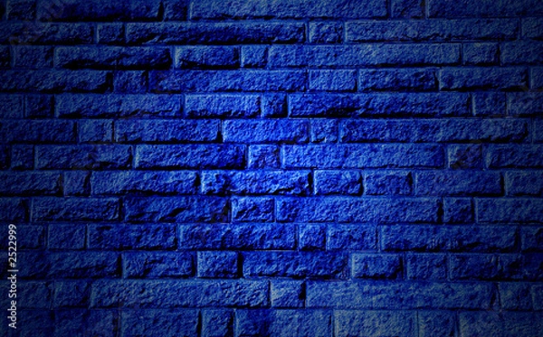 Obraz blue stone wall background with highlighted center
