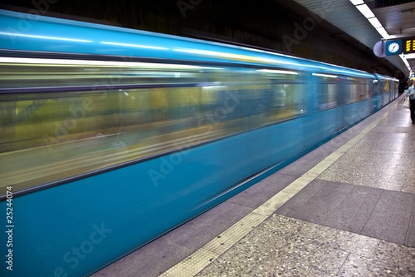 Obraz Train with speed in the station