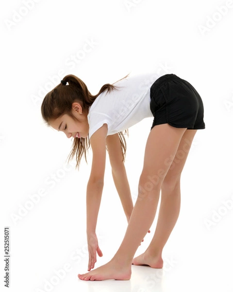 Obraz The gymnast perform an acrobatic element.