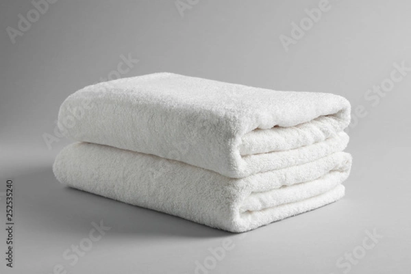 Obraz Fresh soft folded towels on light background