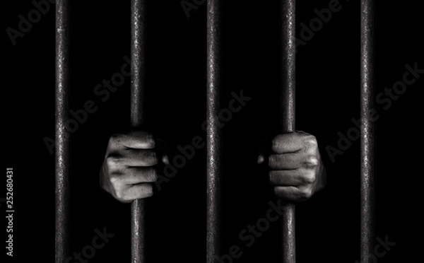 Fototapeta Hands of the prisoner