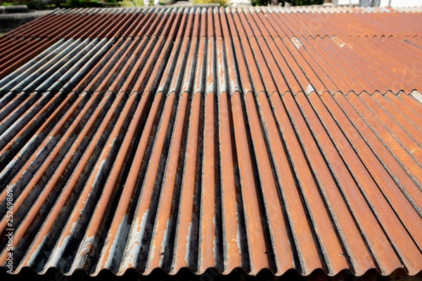Fototapeta Rusty slate roof of barn