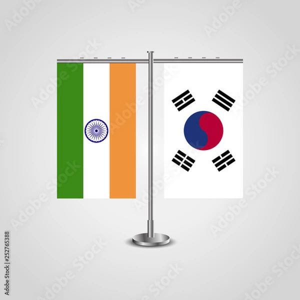 Obraz Table stand with flags of India and South Korea.Two flag. Flag pole. Symbolizing the cooperation between the two countries. Table flags