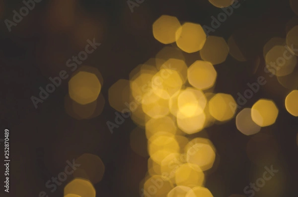 Obraz yellow bokeh abstract blurred light wallpaper backgrund.