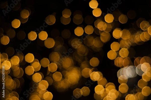 Obraz yellow bokeh abstract blurred light wallpaper backgrund.