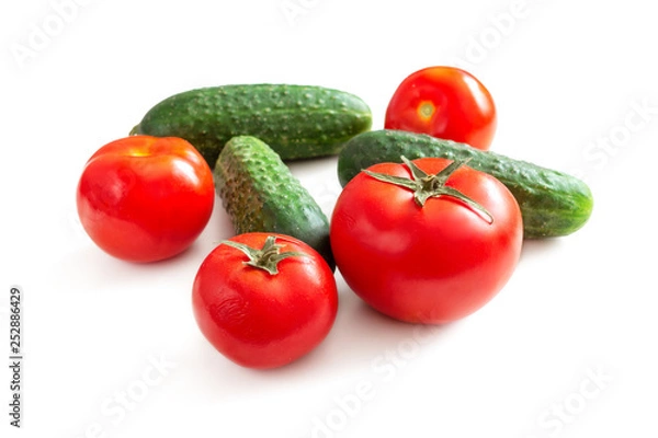 Obraz Cucumbers and tomatoes on the table