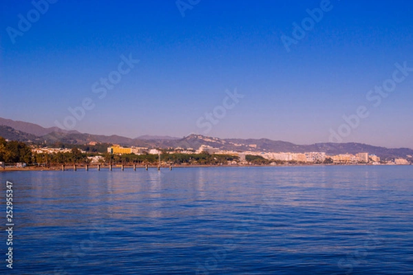 Fototapeta Beach. View of the evening beach of Marbella.