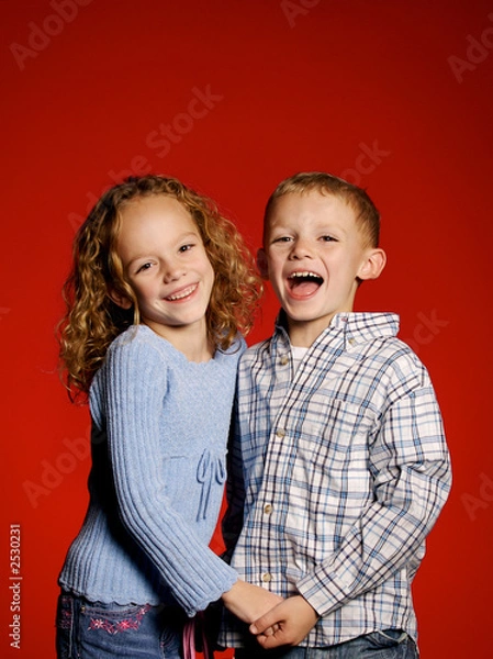Fototapeta two kids on red