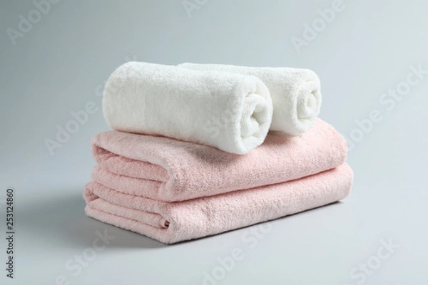 Obraz Stack of fresh towels on light background