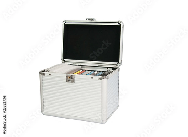 Obraz Open aluminium box with cd cases inside