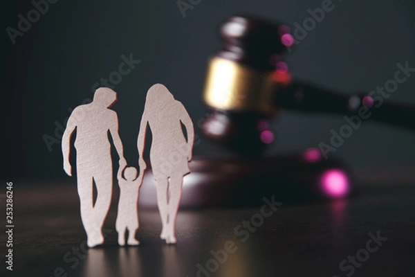 Obraz Family figure and gavel on table. Family law concept