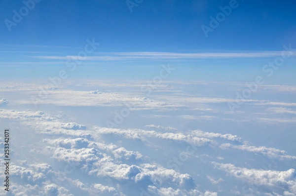 Obraz The sky with clouds view from airplane window