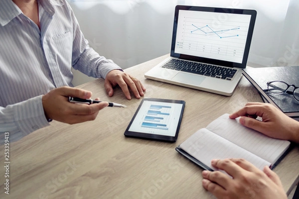 Fototapeta executives and discussing at business meeting, in office, colleagues management.