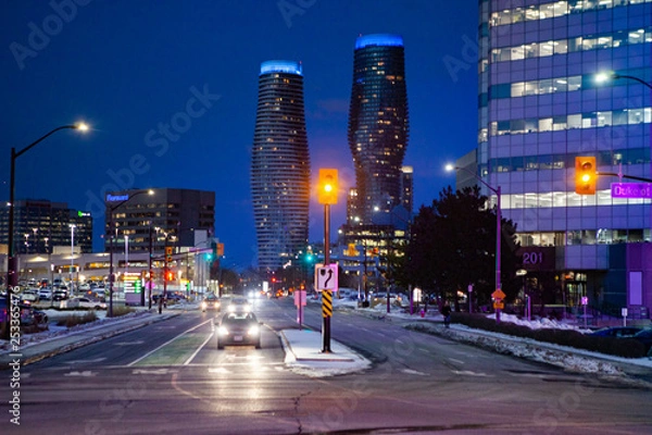 Fototapeta Mississauga, Canada, February 14, 2019: Twin towers of Absolute Condos in, these high-rise Mississauga condos were built in 2007 by Fernbrook Homes. Located in Mississauga's City Centre neighbourhood