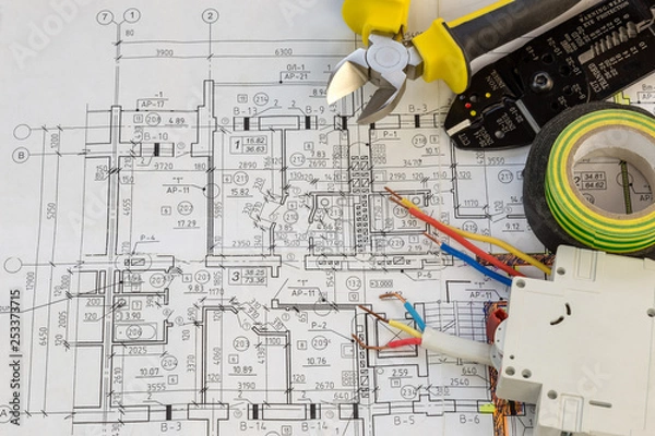 Fototapeta Still Life Of Electrical Components Arranged On Plans