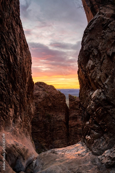 Fototapeta The sun sets at the bottom of the Window Trail in Big Bend National Park, Texas