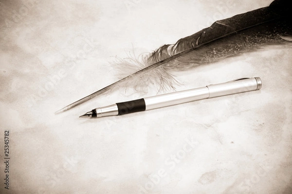 Fototapeta image of feather and pen