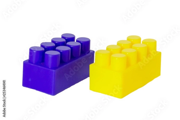 Fototapeta details of a children's plastic constructor on a white background. colored cubes. block.