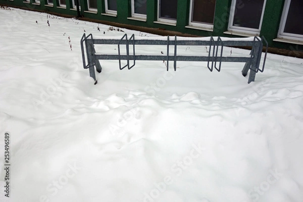 Fototapeta Snowy bicycle stand