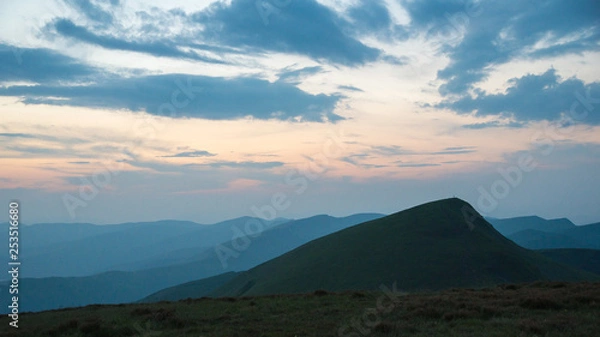 Obraz Background with mountains in the fog. Dark sunset time