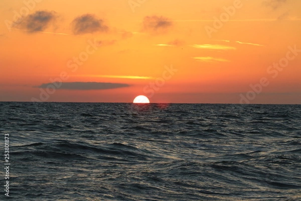 Obraz half setting sun in Florida