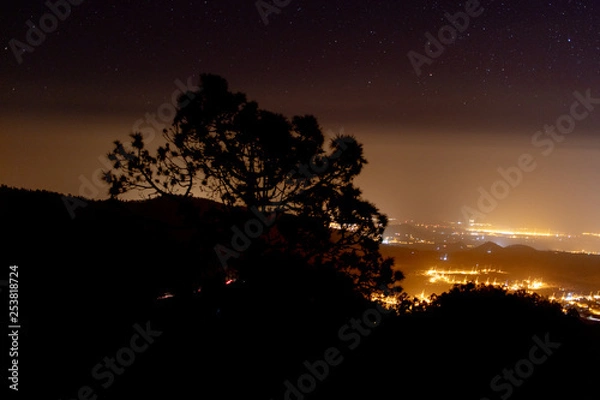 Obraz light pollution over the small town