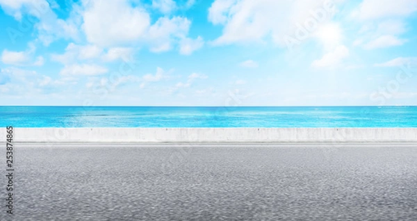 Fototapeta Empty asphalt road with sea and sky for mockup