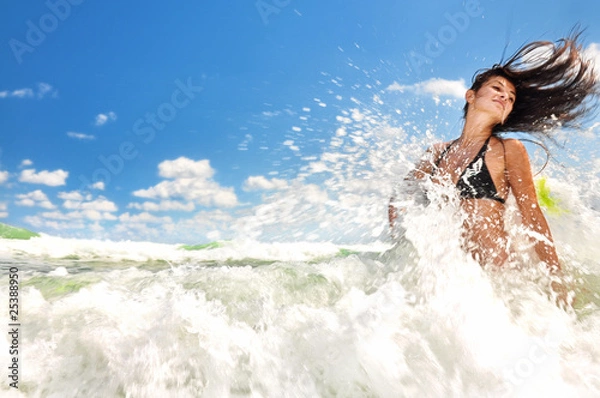 Obraz Beautiful girl splashing in the ocean