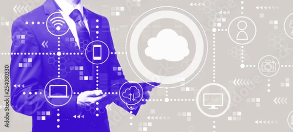 Obraz Cloud computing with businessman holding a tablet computer