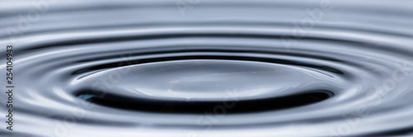Fototapeta Water droplet splash background texture isolated on white. Fresh clean pure water ripples and splashes.