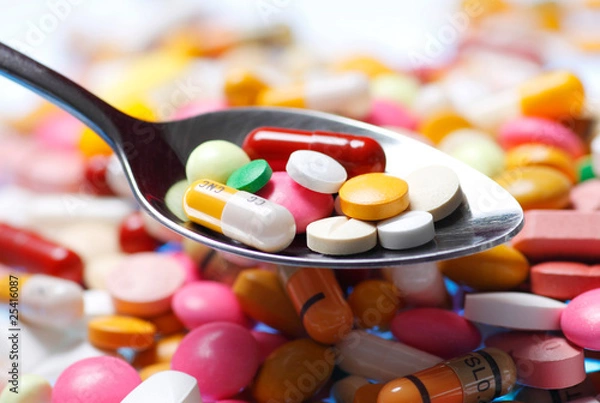 Obraz Tabletten auf Löffel