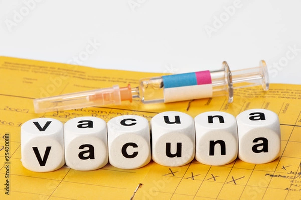 Fototapeta vacunar; vacuna escrito con dados