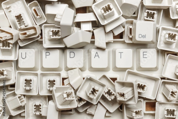 Fototapeta Word update from a heap of computer keys