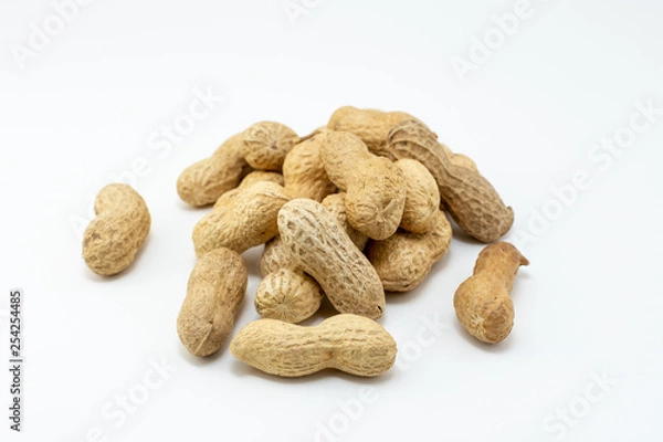 Fototapeta Group of peanuts with shell isolated on white background