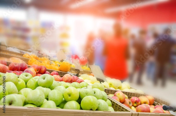 Fototapeta Fresh fruits on shelf in supermarket. Selected focus