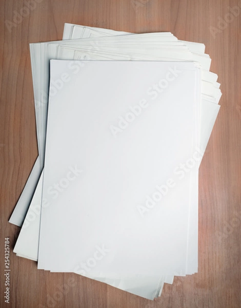 Fototapeta Stack white paper template on work table