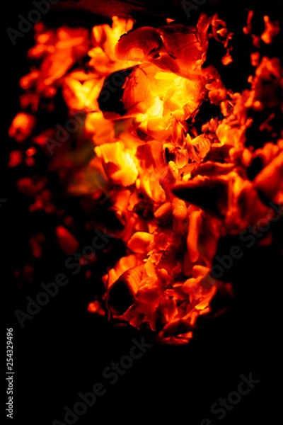 Obraz burning firewood on black background