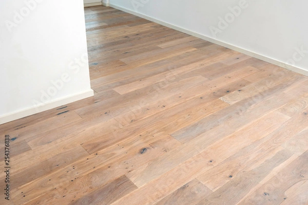 Obraz Parkett Eiche hell mit Fliesen Mauerwerk