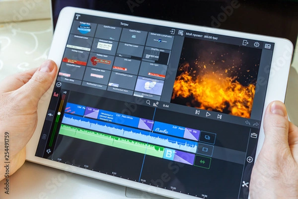Obraz White plane in hand. On-screen video editing program