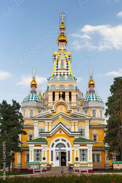 Fototapeta The Ascension Cathedral in Almaty, Kazakhstan. Is a Russian Orthodox cathedral. Completed in 1907, the cathedral is made out of wood but without nails and second tallest wooden building in the world.