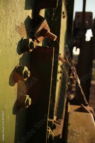 Fototapeta rusty bolts on constructions
