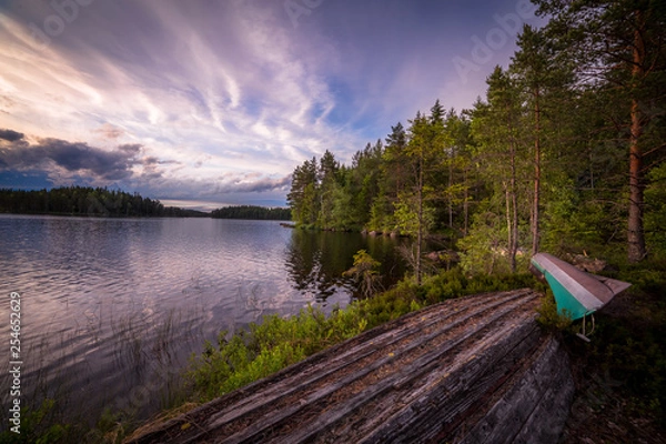 Obraz altes boot an einem see