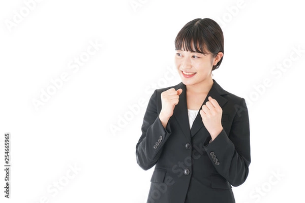 Fototapeta ガッツポーズをするビジネスウーマン